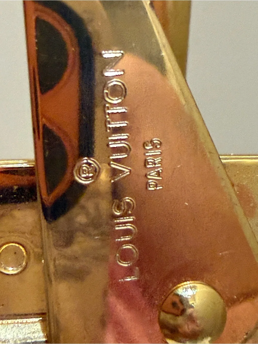 Louis Vuitton polished gold